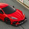 Top view of a Corvette C8 with carbon fiber splitter on the track.